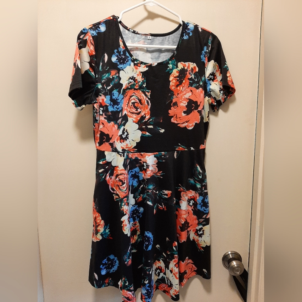 Black floral, short sleeved dress.